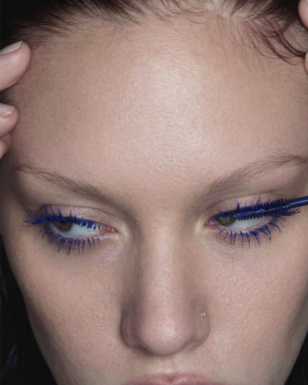 Blue mascara close-up